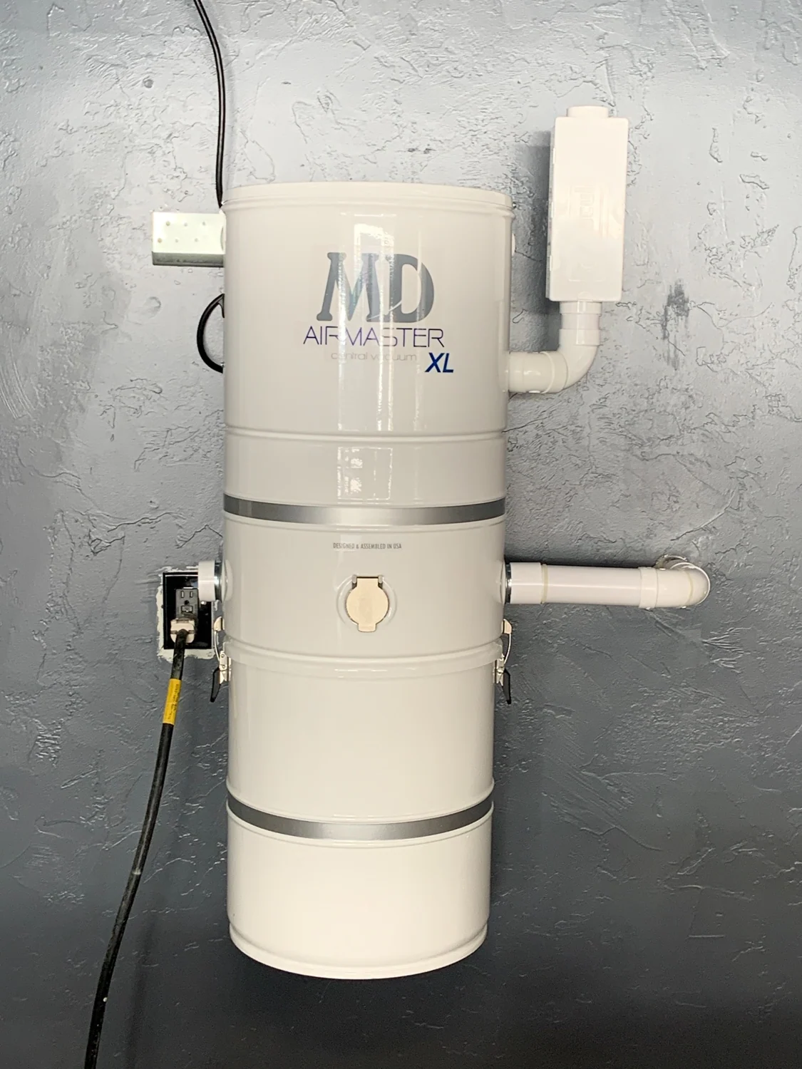 Central vacuum power unit and filtration setup.