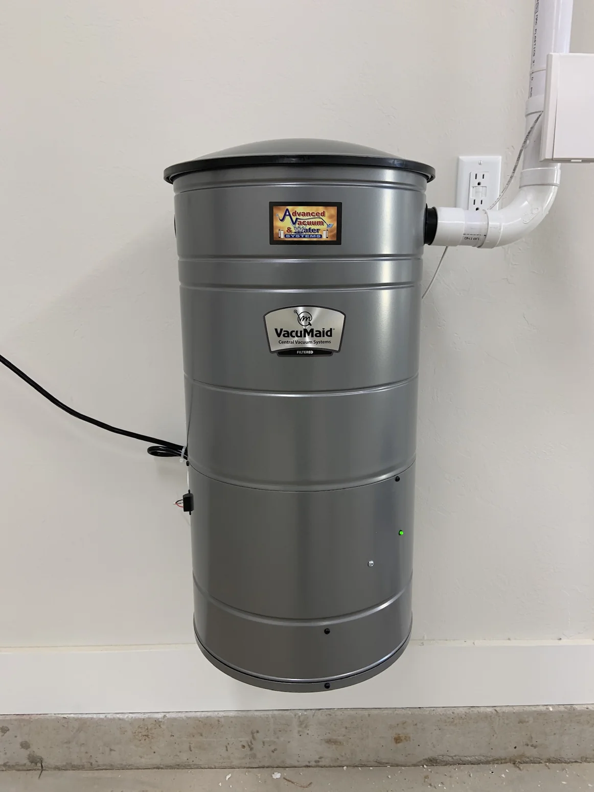Central vacuum power unit installed in a home
